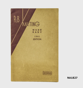Paper booklet in two shades of brown containing knitting instructions.
