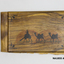 Woode covered book with illustration of three camels on front. 