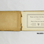 Woode covered book with illustration of three camels on front. 