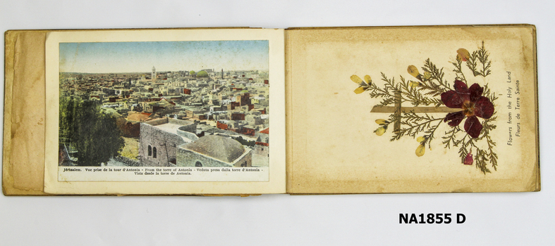 Woode covered book with illustration of three camels on front. 