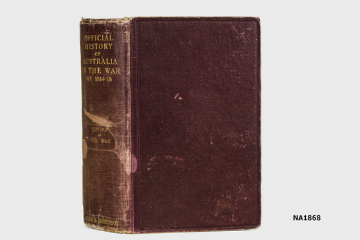 Red covered book of photographs of Australians' activities during the Great War - 1914-1918.