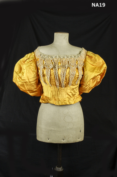 Yellow silk taffeta evening top.