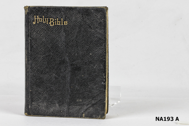 Black leather covered Holy Bible