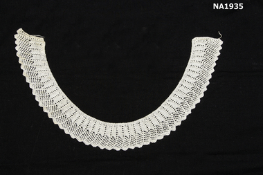 White cotton hand knitted collar.