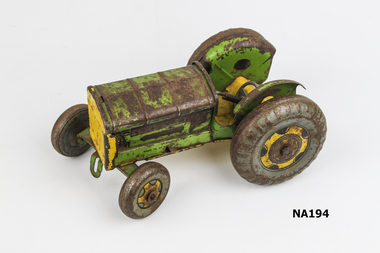 Green and yellow painted metal toy tractor 