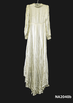 Cream satin long wedding dress with back train. (back)