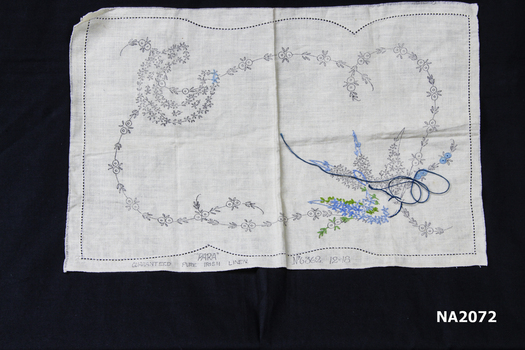 Piece of linen with pattern printed on ready for embroidery.