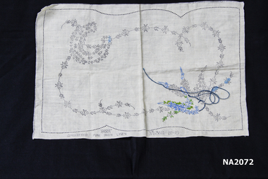 Piece of linen with pattern printed on ready for embroidery.