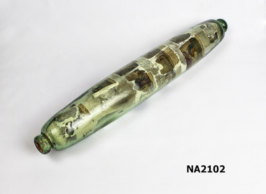 Glassling pin with cork at one end. 