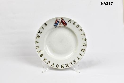 Child's china plate with gold letters