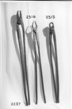 Tongs  used for holding hot steel 