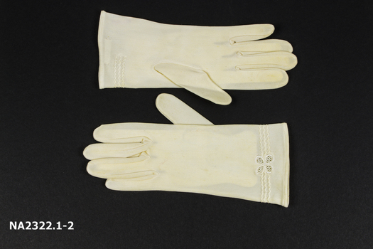 Pair cream gloves 