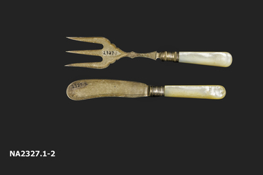 Silver plated ornately decorated with flower pattern, knife and three pronged fork with mother of pearl handles.