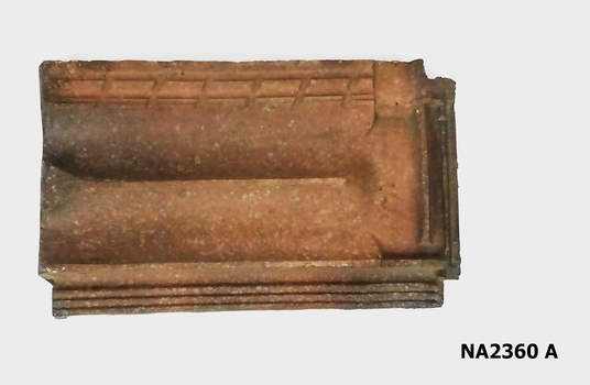 Teracotta ridged roofing tile.