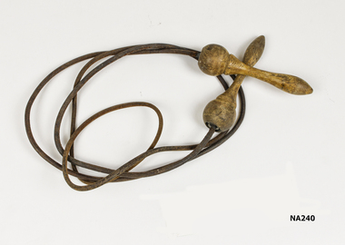 Leather skipping rope with wooden handles.