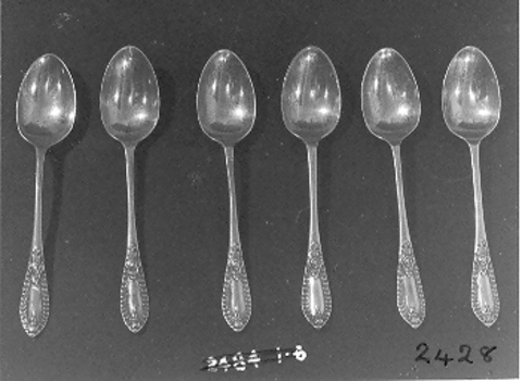 Six small silver teaspoons