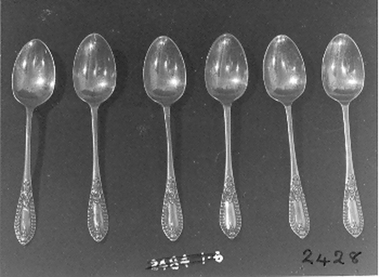 Six small silver teaspoons