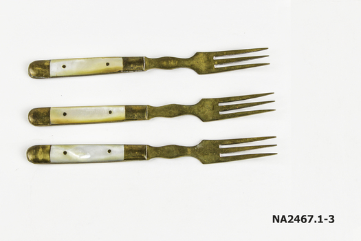 Three small dessert forks 