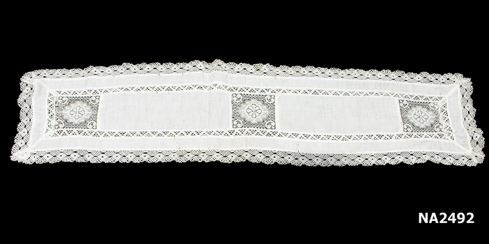 Three lace inserts in centre.