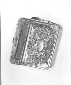 'Rapid' tobacco tin for storing tobacco and contains 'Tally Ho' rice tobacco papers. 