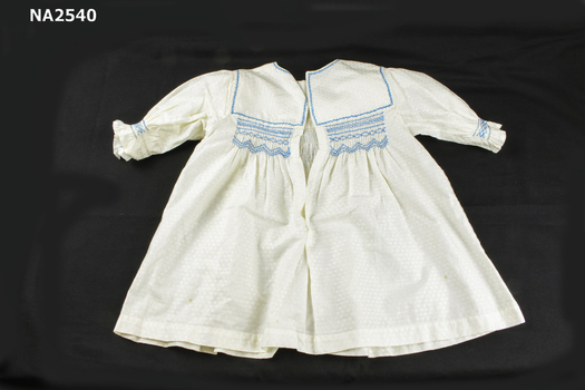 smocked in blue at yoke and sleeve