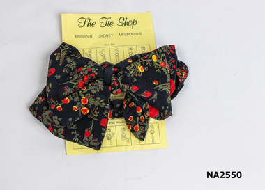 Silk bow tie (ready made) with adjustable collar band. 