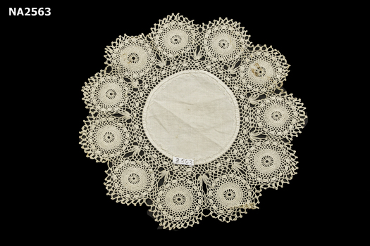 Ecru coloured crochet doyley with 11 medallions 