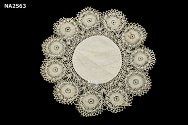 Ecru coloured crochet doyley with 11 medallions 