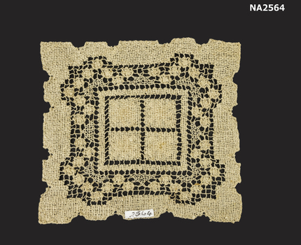 Square coffee coloured doyley or table mat.