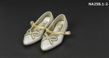 White child's leather shoes
