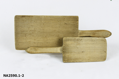 Two wooden butter pats