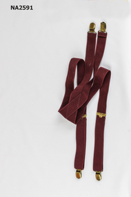 Physical description  Maroon/wine coloured elastic men's braces 