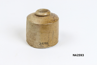 Brown earthenware ink bottle of 19th century.