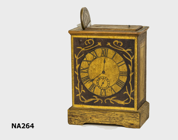 Wooden child's money box 