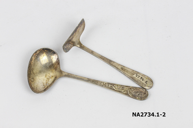 Silver baby's spoon with design engraved on handle, 