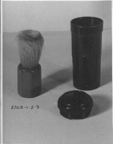 Bristle shaving brush with red handle
