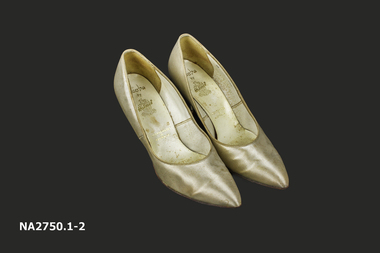 Pair oyster coloured satin covered leather shoes, 