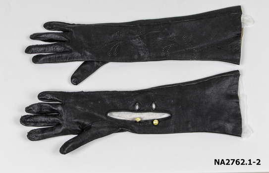 Pair of women's mid length pull on navy blue leather evening gloves. T