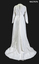 1978 White wedding dress in a fiber material with all over pattern embossed full length with train (back)