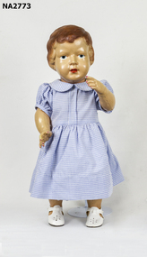 Doll in blue dress