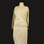 Knitted and crochet three piece costume of a jumper, jacket and skirt. Colour Old Gold.