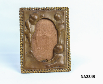  Leather tooled picture frame with laced edged edge, oval centre for picture, tooled around edge. 