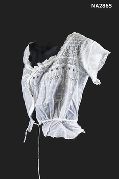 Bust bodice with square lace yoke with short sleeves that are lace edged with four buttons down front.