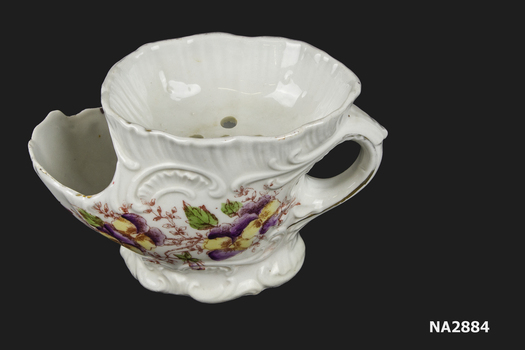 White porcelain shaving mug with position for brush.