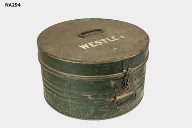 Metal green painted oval shaped hat box.