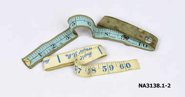 Cream coloured tape measure, measuring 60 inches.