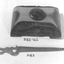 Oblong block of Mulga Wood with circular hole in middle to contain a black plastic inkwell.