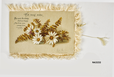 Birthday card with cream fringe and autumn flowers. words on each of four sides -