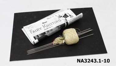Knitted lace doyley & cotton (ecru) on five steel Fairy Knitting Needles. 