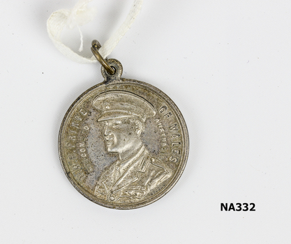 Silver plated embossed medal